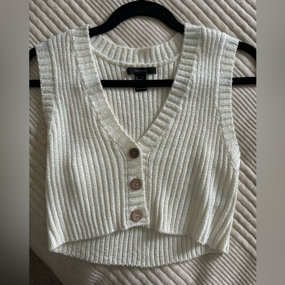 Cropped sleeveless vest